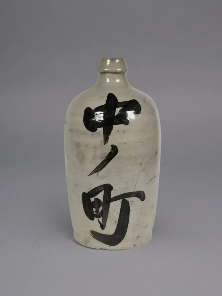 A Japanese stoneware sake bottle, Image 1++